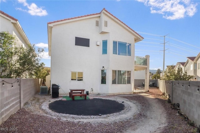 3632 Julia Waldene Ct, Las Vegas, NV 89129 - back of house featuring cooling unit, stucco siding, a fenced backyard, and a tile roof