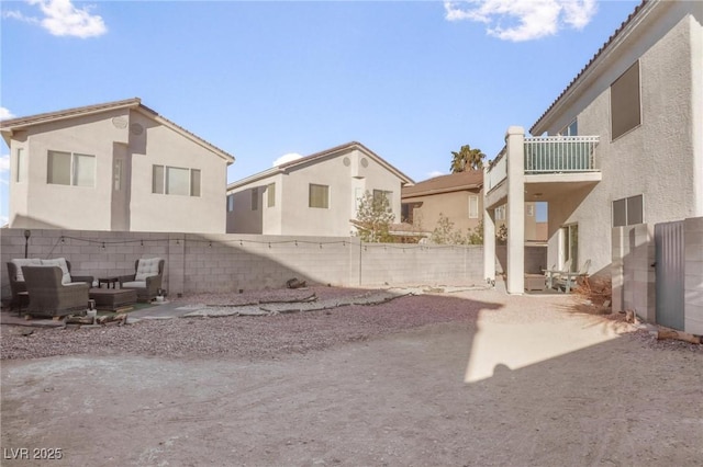 3632 Julia Waldene Ct, Las Vegas, NV 89129 - fenced backyard with outdoor lounge area, a balcony, and a patio