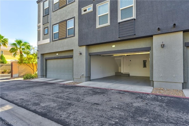 garage featuring fence