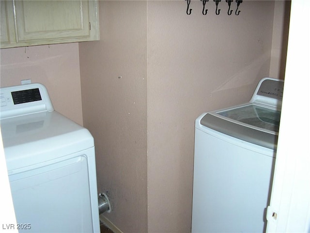 1927 Raspberry Hill Rd, Las Vegas, NV 89142 - laundry room with cabinet space and washer and dryer