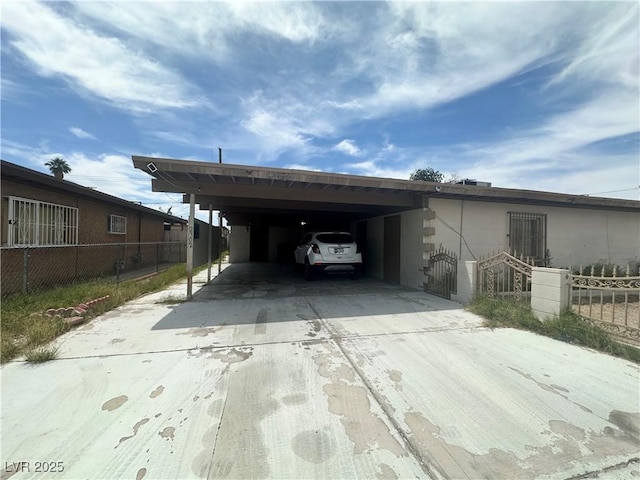 2300 Pardee Pl, Las Vegas, NV 89104 - view of vehicle parking featuring concrete driveway and an attached carport