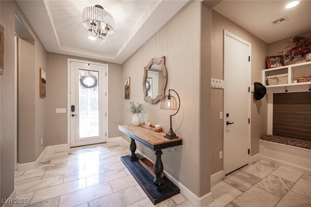 3698 Regatta Landing Dr, Las Vegas, NV 89141 - foyer featuring a chandelier, baseboards, and light marble finish floors
