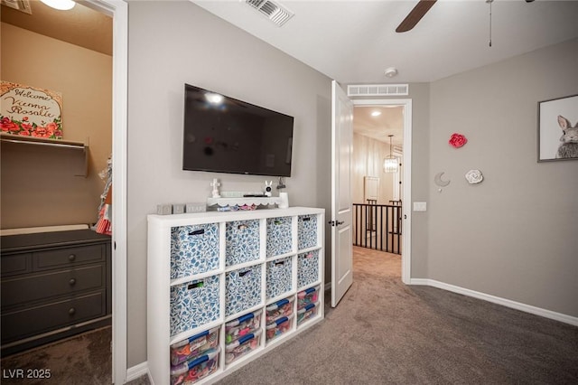 3698 Regatta Landing Dr, Las Vegas, NV 89141 - carpeted bedroom with baseboards and a ceiling fan