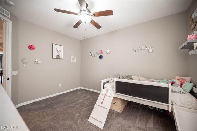 3698 Regatta Landing Dr, Las Vegas, NV 89141 - carpeted bedroom with ceiling fan and baseboards