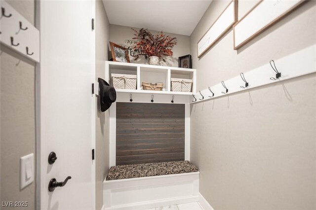 3698 Regatta Landing Dr, Las Vegas, NV 89141 - mudroom featuring baseboards and marble finish floors