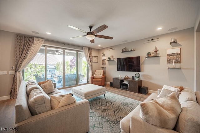 3698 Regatta Landing Dr, Las Vegas, NV 89141 - living room featuring a ceiling fan, baseboards, wood finished floors, and recessed lighting