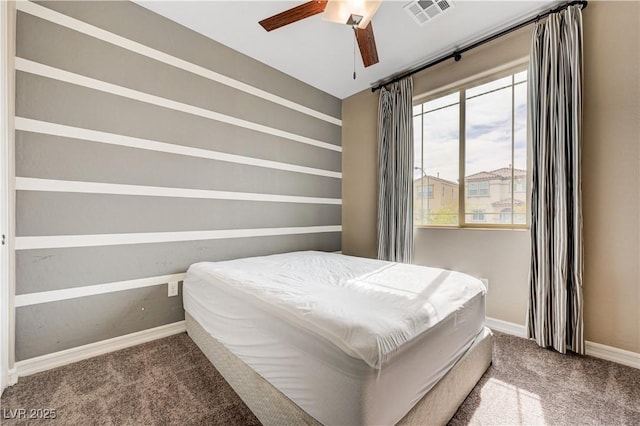 bedroom featuring carpet flooring, baseboards, and ceiling fan