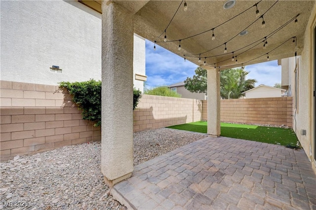 view of patio featuring a fenced backyard