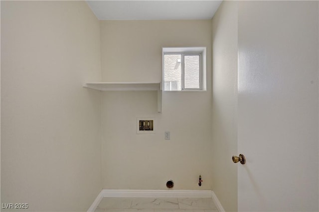 laundry room featuring hookup for a washing machine, baseboards, marble look tiles, and gas dryer hookup