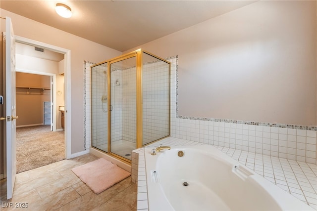 4378 Cherrystone Ct, Las Vegas, NV 89121 - full bath featuring a shower stall, a garden tub, and a spacious closet