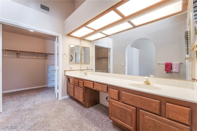 4378 Cherrystone Ct, Las Vegas, NV 89121 - full bathroom with carpet flooring, double vanity, and a walk in closet