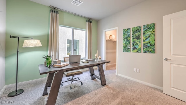 office area featuring carpet and baseboards