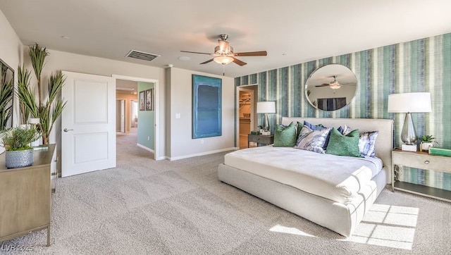 bedroom with wallpapered walls, carpet flooring, baseboards, and ceiling fan