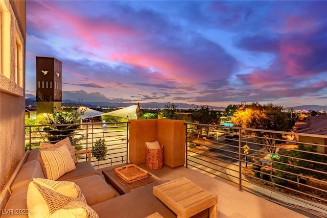 3165 Via Como Dr, Henderson, NV 89044 - balcony at dusk with an outdoor hangout area