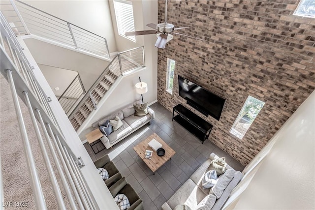 3165 Via Como Dr, Henderson, NV 89044 - living area with a towering ceiling, ceiling fan, and tile patterned flooring