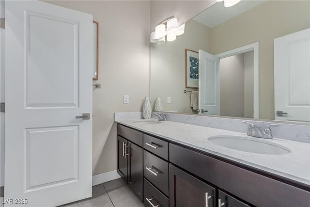 3165 Via Como Dr, Henderson, NV 89044 - bathroom with tile patterned floors, double vanity, and baseboards
