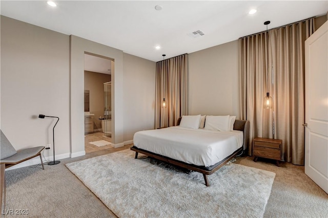11280 Granite Ridge Dr Unit 1035, Las Vegas, NV 89135 - bedroom with light colored carpet, recessed lighting, connected bathroom, and baseboards