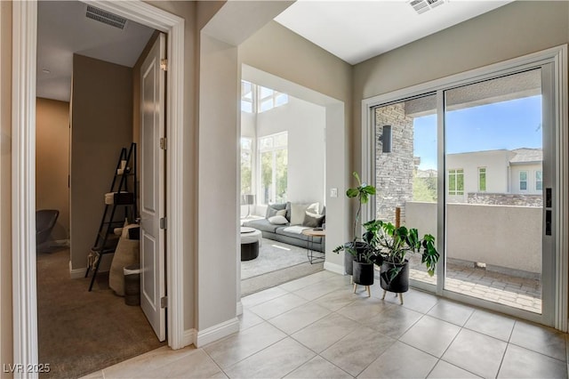 11280 Granite Ridge Dr Unit 1035, Las Vegas, NV 89135 - hall featuring light carpet, baseboards, and light tile patterned flooring