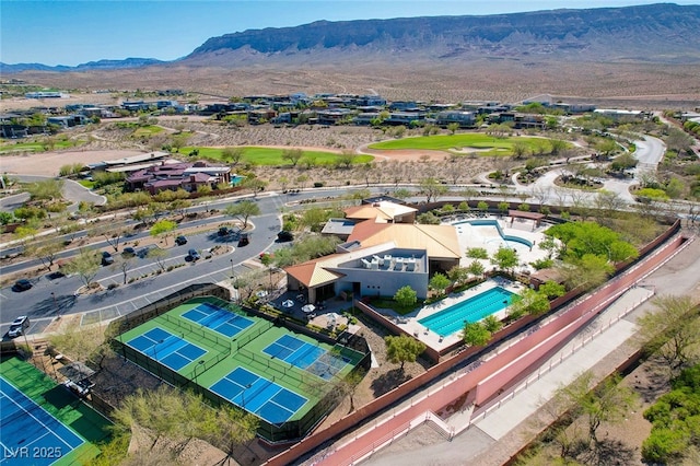 11280 Granite Ridge Dr Unit 1035, Las Vegas, NV 89135 - aerial perspective of suburban area featuring a pool area and a mountain backdrop