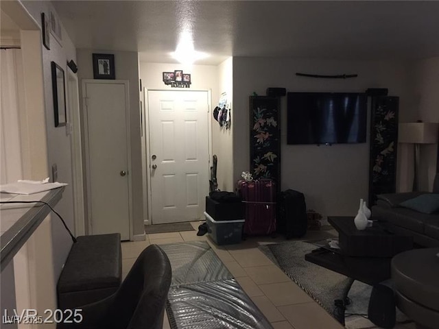 1830 N Pecos Rd Unit 155, Las Vegas, NV 89115 - living room with light tile patterned floors
