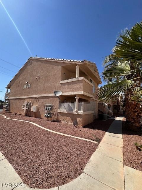 1830 N Pecos Rd Unit 155, Las Vegas, NV 89115 - view of home's exterior with stucco siding