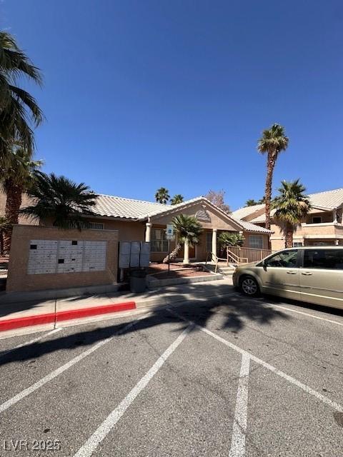 1830 N Pecos Rd Unit 155, Las Vegas, NV 89115 - view of front of house featuring uncovered parking