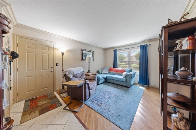 living room featuring ornamental molding and light wood-style floors