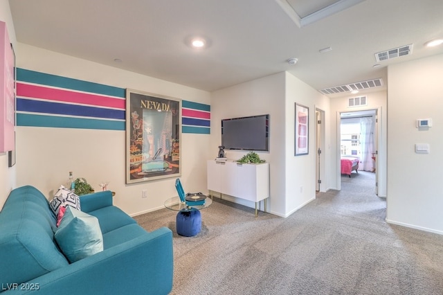 living room with carpet flooring, baseboards, and recessed lighting
