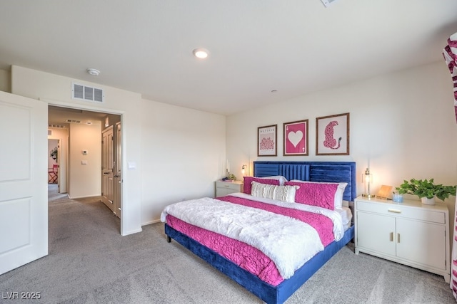 bedroom with carpet, baseboards, and recessed lighting