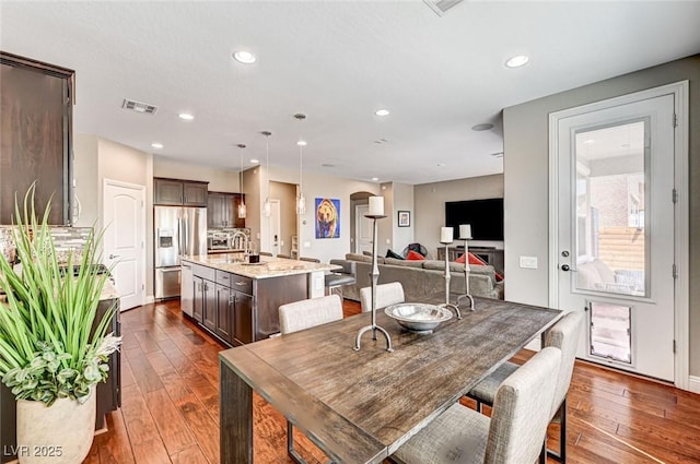2159 Morro Vista Dr, Las Vegas, NV 89135 - dining room with dark wood-type flooring, recessed lighting, and baseboards
