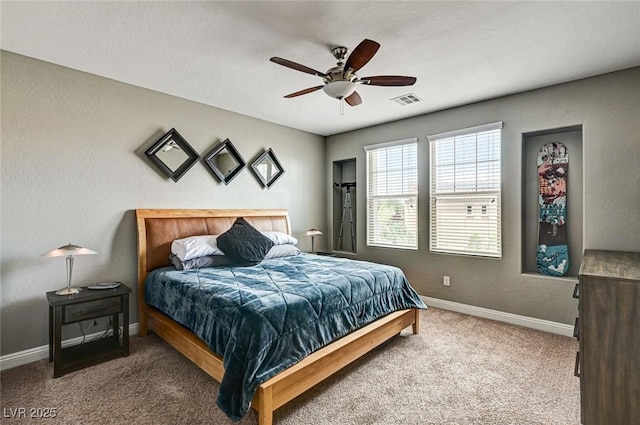 2159 Morro Vista Dr, Las Vegas, NV 89135 - bedroom featuring carpet flooring, baseboards, and ceiling fan