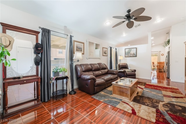 living room with ceiling fan, baseboards, and recessed lighting