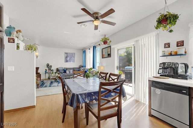 3389 Commendation Dr, Las Vegas, NV 89117 - dining space featuring a ceiling fan and light wood-type flooring