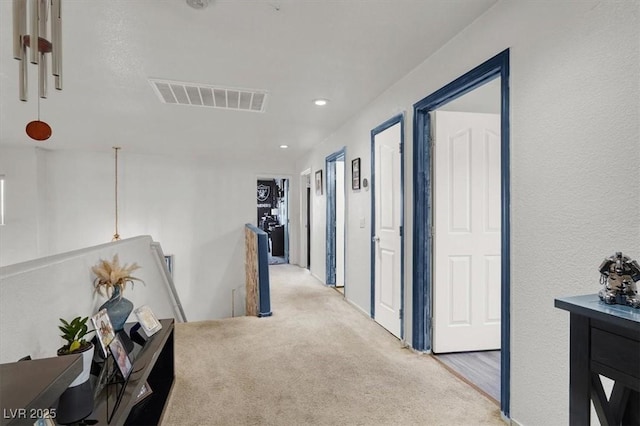 3389 Commendation Dr, Las Vegas, NV 89117 - hallway featuring an upstairs landing, carpet floors, and recessed lighting