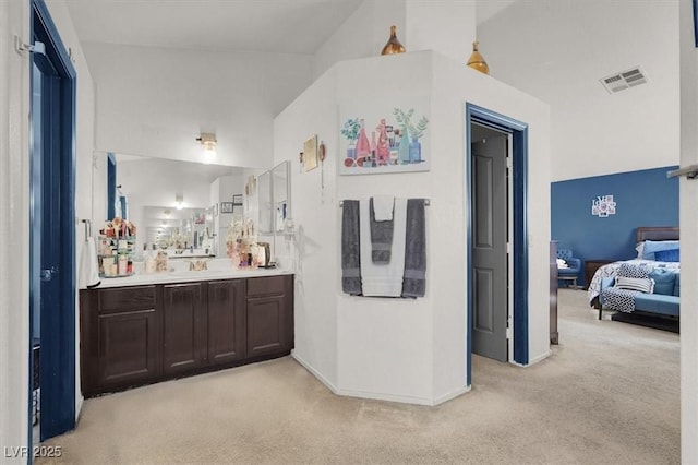 3389 Commendation Dr, Las Vegas, NV 89117 - ensuite bathroom featuring carpet flooring, baseboards, and vanity