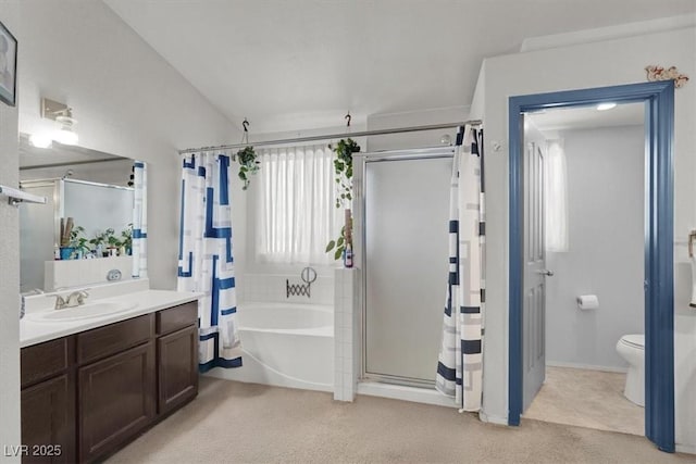 3389 Commendation Dr, Las Vegas, NV 89117 - bathroom featuring a stall shower, vanity, toilet, and a bath