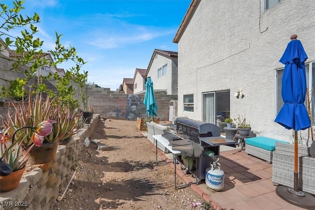 3389 Commendation Dr, Las Vegas, NV 89117 - fenced backyard featuring a patio area