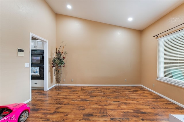 120 N Phyllis St, Las Vegas, NV 89110 - unfurnished room with wood finished floors, baseboards, and recessed lighting
