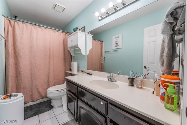 120 N Phyllis St, Las Vegas, NV 89110 - bathroom with tile patterned floors, toilet, and vanity
