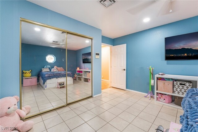 120 N Phyllis St, Las Vegas, NV 89110 - tiled bedroom featuring recessed lighting and a closet