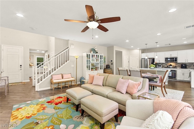 419 Vigo Port St, Las Vegas, NV 89138 - living area with stairway, dark wood-type flooring, recessed lighting, ceiling fan, and baseboards