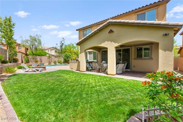 419 Vigo Port St, Las Vegas, NV 89138 - back of property featuring stucco siding, a patio area, and a tiled roof