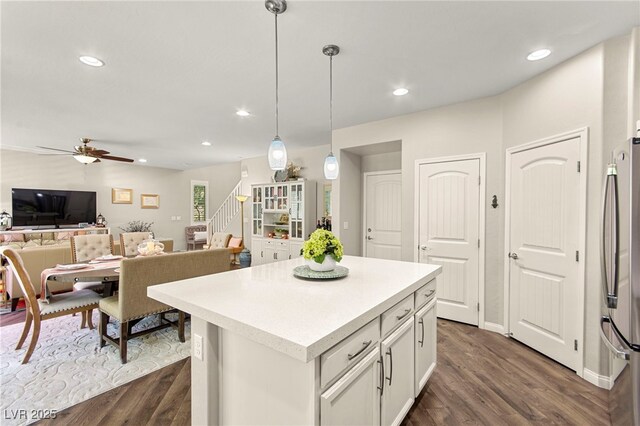 419 Vigo Port St, Las Vegas, NV 89138 - kitchen with freestanding refrigerator, a ceiling fan, dark wood-style floors, a kitchen island, and recessed lighting