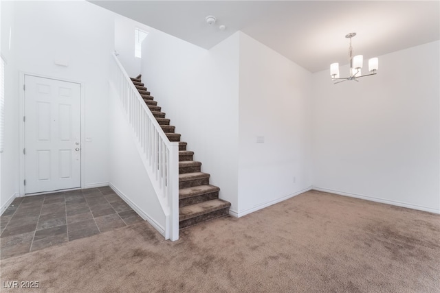 2767 Lindsey Springs St, Las Vegas, NV 89142 - staircase with a chandelier and carpet