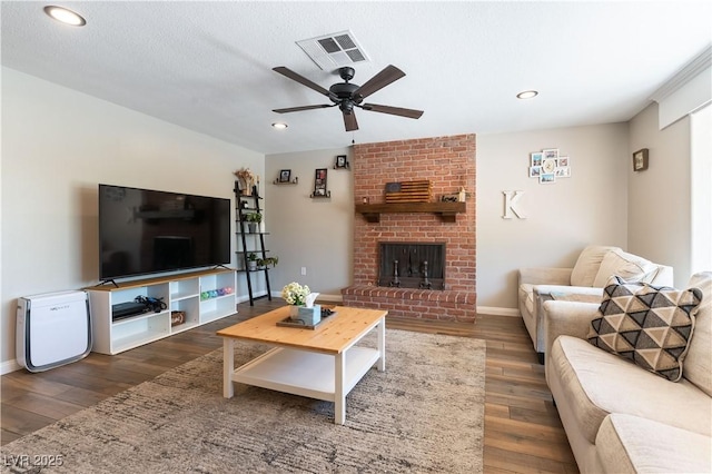 100 Walker Way, Boulder City, NV 89005 - living area featuring wood finished floors, ceiling fan, recessed lighting, a brick fireplace, and baseboards