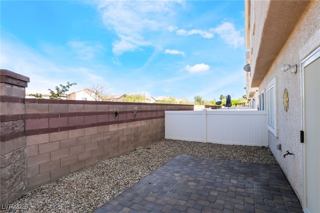 view of patio featuring a fenced backyard