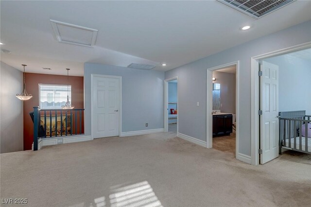 9780 Ziegler Ave, Las Vegas, NV 89148 - unfurnished room featuring light colored carpet, baseboards, and recessed lighting