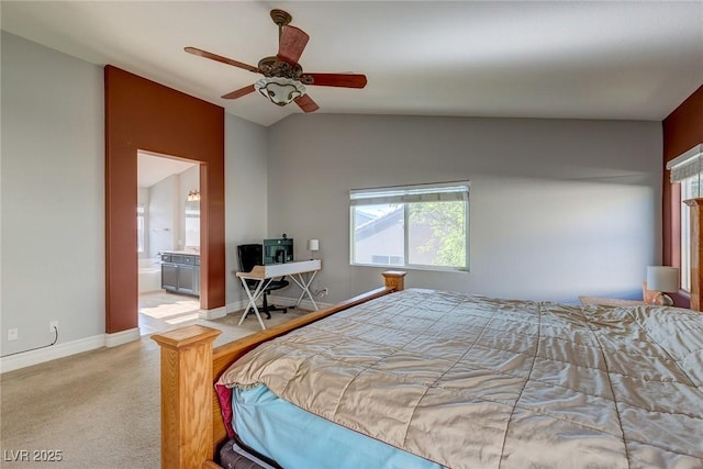 9780 Ziegler Ave, Las Vegas, NV 89148 - bedroom with vaulted ceiling, light colored carpet, baseboards, ensuite bathroom, and ceiling fan