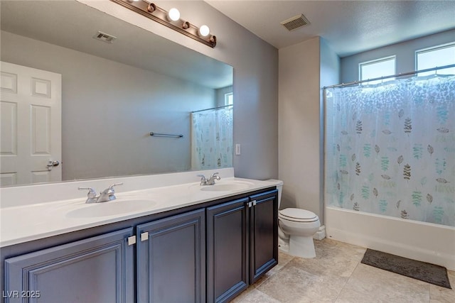 9780 Ziegler Ave, Las Vegas, NV 89148 - bathroom with double vanity, toilet, shower / bathtub combination with curtain, and tile patterned floors