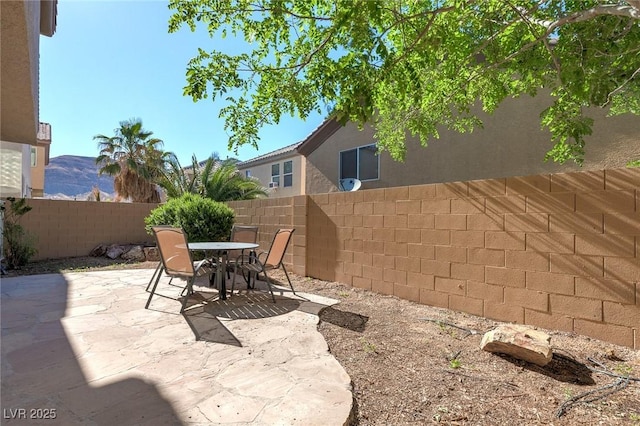 9780 Ziegler Ave, Las Vegas, NV 89148 - fenced backyard with a patio area and outdoor dining space
